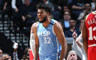 MINNEAPOLIS, MN -  JANUARY 24: Karl-Anthony Towns #32 of the Minnesota Timberwolves reacts to play against the Houston Rockets on January 24, 2020 at Target Center in Minneapolis, Minnesota. NOTE TO USER: User expressly acknowledges and agrees that, by downloading and or using this Photograph, user is consenting to the terms and conditions of the Getty Images License Agreement. Mandatory Copyright Notice: Copyright 2020 NBAE (Photo by David Sherman/NBAE via Getty Images)