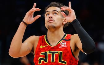 ATLANTA, GEORGIA - JANUARY 26:  Trae Young #11 of the Atlanta Hawks reacts after hitting a three-point basket against the Washington Wizards in the second half at State Farm Arena on January 26, 2020 in Atlanta, Georgia.  NOTE TO USER: User expressly acknowledges and agrees that, by downloading and/or using this photograph, user is consenting to the terms and conditions of the Getty Images License Agreement.  (Photo by Kevin C. Cox/Getty Images)