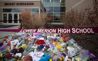 ARDMORE, PA - JANUARY 27: Basketballs, flowers, letters, and jerseys are left at a memorial for former Los Angeles Laker Kobe Bryant after he was killed in a helicopter crash, at Lower Merion High School on January 27, 2020 in Ardmore, Pennsylvania. (Photo by Mitchell Leff/Getty Images)