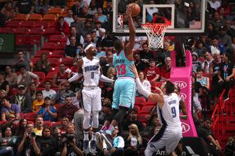 MIAMI, FL - JANUARY 27: Bam Adebayo #13 of the Miami Heat dunks the ball against the Orlando Magic on January 27, 2020 at American Airlines Arena in Miami, Florida. NOTE TO USER: User expressly acknowledges and agrees that, by downloading and or using this Photograph, user is consenting to the terms and conditions of the Getty Images License Agreement. Mandatory Copyright Notice: Copyright 2020 NBAE (Photo by Issac Baldizon/NBAE via Getty Images)