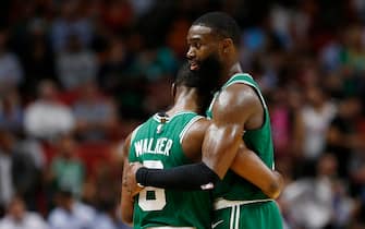 MIAMI, FLORIDA - JANUARY 28:  Jaylen Brown #7 and Kemba Walker #8 of the Boston Celtics celebrate against the Miami Heat during the second half at American Airlines Arena on January 28, 2020 in Miami, Florida. NOTE TO USER: User expressly acknowledges and agrees that, by downloading and/or using this photograph, user is consenting to the terms and conditions of the Getty Images License Agreement.  (Photo by Michael Reaves/Getty Images)