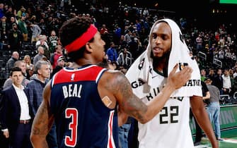 MILWAUKEE, WI - JANUARY 28: Khris Middleton #22 of the Milwaukee Bucks and Bradley Beal #3 of the Washington Wizards speak following the game on January 28, 2020 at the Fiserv Forum Center in Milwaukee, Wisconsin. NOTE TO USER: User expressly acknowledges and agrees that, by downloading and or using this Photograph, user is consenting to the terms and conditions of the Getty Images License Agreement. Mandatory Copyright Notice: Copyright 2020 NBAE (Photo by Gary Dineen/NBAE via Getty Images). 