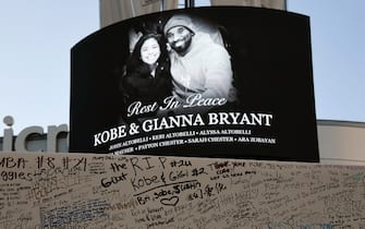 LOS ANGELES, CA - JANUARY 28: Fans leave condolence message on boards to pay their respects to Kobe Bryant and his daughter Gianna, 13, at a memorial set up outside of Staples Center on January 28, 2020 in Los Angeles, California. Kobe his daughter Gianna,  were among nine people killed in a helicopter crash on January 26 in Calabasas, California. (Photo by Kevork Djansezian/Getty Images)