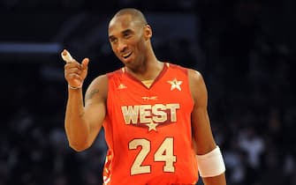 Kobe Bryant of the L.A. Lakers playing for the West team, gestures before winning the MVP award during the All-Stars Game at the Staples Center in Los Angeles on February 20, 2011. The game won by the West team 148-143 is the 60th NBA All-Star Game showdown between the Eastern and Western conference superstars.        AFP PHOTO/Mark RALSTON (Photo credit should read MARK RALSTON/AFP via Getty Images)
