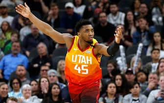 1197517065 SAN ANTONIO, TX - JANUARY 29: Donovan Mitchell #45 of the Utah Jazz looks for a foul during second half action at AT&T Center on January 29, 2020 in San Antonio, Texas. San Antonio Spurs defeated the Utah Jazz 127-120. NOTE TO USER: User expressly acknowledges and agrees that , by downloading and or using this photograph, User is consenting to the terms and conditions of the Getty Images License Agreement. (Photo by Ronald Cortes/Getty Images)