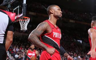 PORTLAND, OR - JANUARY 29: Damian Lillard #0 of the Portland Trail Blazers looks on during the game against the Houston Rockets on January 29, 2020 at the Moda Center Arena in Portland, Oregon. NOTE TO USER: User expressly acknowledges and agrees that, by downloading and or using this photograph, user is consenting to the terms and conditions of the Getty Images License Agreement. Mandatory Copyright Notice: Copyright 2020 NBAE (Photo by Sam Forencich/NBAE via Getty Images)