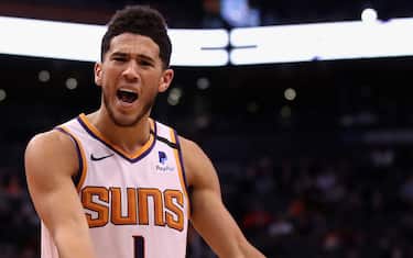 PHOENIX, ARIZONA - JANUARY 07: Devin Booker #1 of the Phoenix Suns reacts to a call during the second half the NBA game against the Sacramento Kings at Talking Stick Resort Arena on January 07, 2020 in Phoenix, Arizona.  The Kings defeated the Suns 114-103. NOTE TO USER: User expressly acknowledges and agrees that, by downloading and or using this photograph, user is consenting to the terms and conditions of the Getty Images License Agreement. Mandatory Copyright Notice: Copyright 2020 NBAE. (Photo by Christian Petersen/Getty Images)