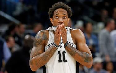 SAN ANTONIO, TX - JANUARY 29:  DeMar DeRozan #10 of the San Antonio Spurs checks out the clock during second half action against the Utah Jazz at AT&T Center on January 29, 2020 in San Antonio, Texas.  San Antonio Spurs defeated the Utah Jazz 127-120. NOTE TO USER: User expressly acknowledges and agrees that , by downloading and or using this photograph, User is consenting to the terms and conditions of the Getty Images License Agreement. (Photo by Ronald Cortes/Getty Images)