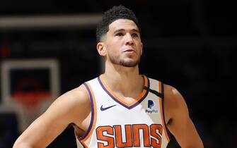 MEMPHIS, TN - JANUARY 26: Devin Booker #1 of the Phoenix Suns looks on during the game against the Memphis Grizzlies on January 26, 2020 at FedExForum in Memphis, Tennessee. NOTE TO USER: User expressly acknowledges and agrees that, by downloading and or using this photograph, User is consenting to the terms and conditions of the Getty Images License Agreement. Mandatory Copyright Notice: Copyright 2020 NBAE (Photo by Joe Murphy/NBAE via Getty Images)
