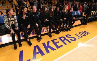 LOS ANGELES, CALIFORNIA - JANUARY 31:  Members of Gigi Bryant's Mamba Sports Academy team sit courtside before the game between the Los Angeles Lakers and the Portland Trail Blazers at Staples Center on January 31, 2020 in Los Angeles, California. (Photo by Harry How/Getty Images)