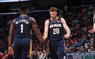 MEMPHIS, TN - JANUARY 31: Zion Williamson #1 and Nicolo Melli #20 of the New Orleans Pelicans hi-five during the game against the Memphis Grizzlies on January 31, 2020 at FedExForum in Memphis, Tennessee. NOTE TO USER: User expressly acknowledges and agrees that, by downloading and or using this photograph, User is consenting to the terms and conditions of the Getty Images License Agreement. Mandatory Copyright Notice: Copyright 2020 NBAE (Photo by Joe Murphy/NBAE via Getty Images)