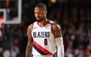 PORTLAND, OR - FEBRUARY 1: Damian Lillard #0 of the Portland Trail Blazers looks on during a game against the Utah Jazz on February 01, 2020 at the Moda Center Arena in Portland, Oregon. NOTE TO USER: User expressly acknowledges and agrees that, by downloading and or using this photograph, user is consenting to the terms and conditions of the Getty Images License Agreement. Mandatory Copyright Notice: Copyright 2020 NBAE (Photo by Sam Forencich/NBAE via Getty Images)