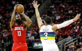 HOUSTON, TEXAS - FEBRUARY 02: James Harden #13 of the Houston Rockets takes a three point shot defended by Josh Hart #3 of the New Orleans Pelicans in the second quarter at Toyota Center on February 02, 2020 in Houston, Texas.  NOTE TO USER: User expressly acknowledges and agrees that, by downloading and or using this photograph, User is consenting to the terms and conditions of the Getty Images License Agreement. (Photo by Tim Warner/Getty Images)
