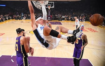 LOS ANGELES, CA - JANUARY 15:  Aaron Gordon #00 of the Orlando Magic dunks the ball as JaVale McGee #7, Danny Green #14 and Kyle Kuzma #0 of the Los Angeles Lakers look on in the first half of the game against the Los Angeles Lakers at the Staples Center on January 15, 2020 in Los Angeles, California. NOTE TO USER: User expressly acknowledges and agrees that, by downloading and/or using this Photograph, user is consenting to the terms and conditions of the Getty Images License Agreement.(Photo by Jayne Kamin-Oncea/Getty Images)