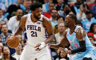 MIAMI, FLORIDA - FEBRUARY 03:  Joel Embiid #21 of the Philadelphia 76ers is defended by Bam Adebayo #13 of the Miami Heat during the second half at American Airlines Arena on February 03, 2020 in Miami, Florida. NOTE TO USER: User expressly acknowledges and agrees that, by downloading and/or using this photograph, user is consenting to the terms and conditions of the Getty Images License Agreement.  (Photo by Michael Reaves/Getty Images)
