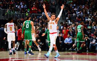1198459597 ATLANTA, GA - FEBRUARY 3: Trae Young #11 of the Atlanta Hawks celebrates during the game against the Boston Celtics on February 3, 2020 at State Farm Arena in Atlanta, Georgia. NOTE TO USER: User expressly acknowledges and agrees that, by downloading and/or using this Photograph, user is consenting to the terms and conditions of the Getty Images License Agreement. Mandatory Copyright Notice: Copyright 2020 NBAE (Photo by Scott Cunningham/NBAE via Getty Images)