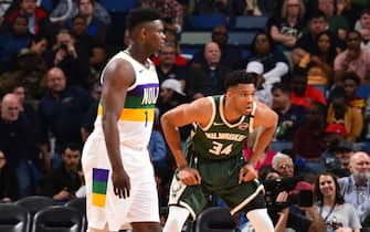 NEW ORLEANS, LA - FEBRUARY 4: Giannis Antetokounmpo #34 of the Milwaukee Bucks plays defense against Zion Williamson #1 of the New Orleans Pelicans on February 4, 2020 at the Smoothie King Center in New Orleans, Louisiana. NOTE TO USER: User expressly acknowledges and agrees that, by downloading and or using this Photograph, user is consenting to the terms and conditions of the Getty Images License Agreement. Mandatory Copyright Notice: Copyright 2020 NBAE (Photo by Jesse D. Garrabrant/NBAE via Getty Images)