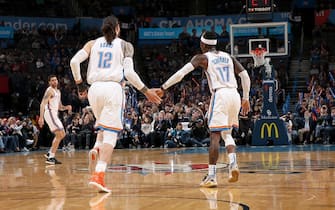 1198878006 OKLAHOMA CITY, OK - FEBRUARY 5: Steven Adams #12, and Dennis Schroder #17 of the Oklahoma City Thunder hi-five each other during the game against the Cleveland Cavaliers on February 5, 2020 at Chesapeake Energy Arena in Oklahoma City, Oklahoma. NOTE TO USER: User expressly acknowledges and agrees that, by downloading and or using this photograph, User is consenting to the terms and conditions of the Getty Images License Agreement. Mandatory Copyright Notice: Copyright 2020 NBAE (Photo by Zach Beeker/NBAE via Getty Images)
