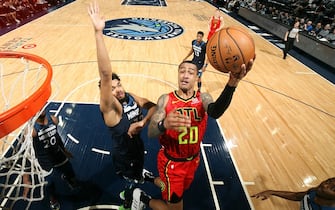 MINNEAPOLIS, MN -  FEBRUARY 5: John Collins #20 of the Atlanta Hawks drives to the basket against the Minnesota Timberwolves on February 5, 2020 at Target Center in Minneapolis, Minnesota. NOTE TO USER: User expressly acknowledges and agrees that, by downloading and or using this Photograph, user is consenting to the terms and conditions of the Getty Images License Agreement. Mandatory Copyright Notice: Copyright 2020 NBAE (Photo by David Sherman/NBAE via Getty Images)