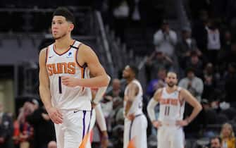 DETROIT, MI - FEBRUARY 5: Devin Booker #1 of the Phoenix Suns walks off the court at the end of the game against the Detroit Pistons at Little Caesars Arena on February 5, 2020 in Detroit, Michigan. Detroit defeated Phoenix 116-108. NOTE TO USER: User expressly acknowledges and agrees that, by downloading and or using this photograph, User is consenting to the terms and conditions of the Getty Images License Agreement (Photo by Leon Halip/Getty Images)
