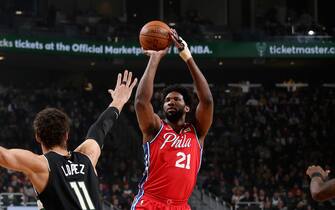 MILWAUKEE, WI - FEBRUARY 6: Joel Embiid #21 of the Philadelphia 76ers shoots the ball during a game against the Milwaukee Bucks on February 6, 2020 at the Fiserv Forum Center in Milwaukee, Wisconsin. NOTE TO USER: User expressly acknowledges and agrees that, by downloading and or using this Photograph, user is consenting to the terms and conditions of the Getty Images License Agreement. Mandatory Copyright Notice: Copyright 2020 NBAE (Photo by Gary Dineen/NBAE via Getty Images).