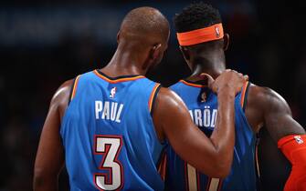 1199284354 OKLAHOMA CITY, OK - FEBRUARY 7: Chris Paul #3 and Dennis Schroder #17 of the Oklahoma City Thunder talk during the game against the Detroit Pistons on February 7, 2020 at Chesapeake Energy Arena in Oklahoma City, Oklahoma. NOTE TO USER: User expressly acknowledges and agrees that, by downloading and or using this photograph, User is consenting to the terms and conditions of the Getty Images License Agreement. Mandatory Copyright Notice: Copyright 2020 NBAE (Photo by Zach Beeker/NBAE via Getty Images)