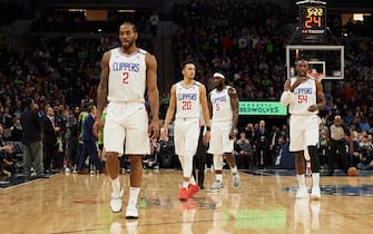 1204947753 MINNEAPOLIS, MINNESOTA - FEBRUARY 08: (L-R) Kawhi Leonard #2, Landry Shamet #20, Montrezl Harrell #5 and Patrick Patterson #54 of the Los Angeles Clippers return to the bench during a break in the game against the Minnesota Timberwolves at Target Center on February 8, 2020 in Minneapolis, Minnesota. NOTE TO USER: User expressly acknowledges and agrees that, by downloading and or using this Photograph, user is consenting to the terms and conditions of the Getty Images License Agreement (Photo by Hannah Foslien/Getty Images)