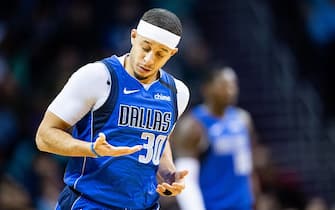 CHARLOTTE, NORTH CAROLINA - FEBRUARY 08: Seth Curry #30 of the Dallas Mavericks looks at his hand after he made a 3 point shot during the third quarter during his game against the Charlotte Hornets at Spectrum Center on February 08, 2020 in Charlotte, North Carolina. NOTE TO USER: User expressly acknowledges and agrees that, by downloading and/or using this photograph, user is consenting to the terms and conditions of the Getty Images License Agreement. (Photo by Jacob Kupferman/Getty Images)