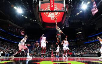 ATLANTA, GA - FEBRUARY 9: Trae Young #11 of the Atlanta Hawks shoots the ball against the New York Knicks on February 09, 2020 at State Farm Arena in Atlanta, Georgia. NOTE TO USER: User expressly acknowledges and agrees that, by downloading and/or using this Photograph, user is consenting to the terms and conditions of the Getty Images License Agreement. Mandatory Copyright Notice: Copyright 2020 NBAE (Photo by Scott Cunningham/NBAE via Getty Images)