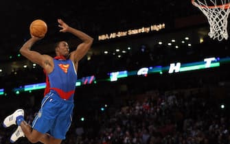 Dwight Howard of the Orlando Magic jumps wearing a Superman Cape in the Sprite Slam-Dunk Contest at the New Orleans Arena during the 2008 NBA All-Star Weekend February 16, 2008 in New Orleans, Louisiana. Howard won the contest with his series of dunks.  AFP PHOTO    TIMOTHY A. CLARY (Photo credit should read TIMOTHY A. CLARY/AFP via Getty Images)