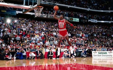 CHICAGO, IL - FEBRUARY 6: Michael Jordan #23 of the Chicago Bulls goes for a dunk during the 1988 NBA All Star Slam Dunk Competition on February 6, 1988 at Chicago Stadium in Chicago, Illinois. Jordan went on to win the Slam Dunk Competition.  HIGH RESOLUTION FILE 42 MB. NOTE TO USER: User expressly acknowledges and agrees that, by downloading and/or using this Photograph, User is consenting to the terms and conditions of the Getty Images License Agreement. Mandatory copyright notice and Credit: Copyright 2001 NBAE  Mandatory Credit: Andrew D. Bernstein/NBAE/Getty Images