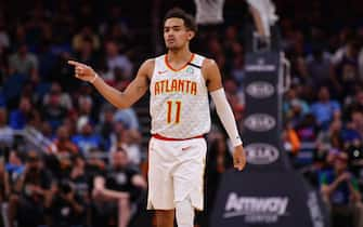 ORLANDO, FLORIDA - FEBRUARY 10: Trae Young #11 of the Atlanta Hawks points to the bench in the first half against the Orlando Magic at Amway Center on February 10, 2020 in Orlando, Florida.  NOTE TO USER: User expressly acknowledges and agrees that, by downloading and/or using this photograph, user is consenting to the terms and conditions of the Getty Images License Agreement.  (Photo by Mark Brown/Getty Images)