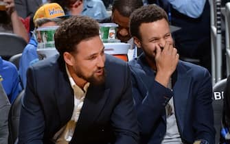 SAN FRANCISCO, CA - NOVEMBER 27: Klay Thompson #11 of the Golden State Warriors and Stephen Curry #30 of the Golden State Warriors smile during a game against the Chicago Bulls on November 27, 2019 at Chase Center in San Francisco, California. NOTE TO USER: User expressly acknowledges and agrees that, by downloading and or using this photograph, user is consenting to the terms and conditions of Getty Images License Agreement. Mandatory Copyright Notice: Copyright 2019 NBAE (Photo by Noah Graham/NBAE via Getty Images)
