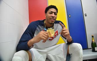 MADRID, SPAIN - SEPTEMBER 14: Anthony Davis #14 of the USA Men's National Team poses for a photo with the gold medal in the locker room after defeating the Serbia National Team during the 2014 FIBA World Cup Finals at Palacio de Deportes on September 14, 2014 in Madrid, Spain.  NOTE TO USER: User expressly acknowledges and agrees that, by downloading and/or using this Photograph, user is consenting to the terms and conditions of the Getty Images License Agreement. Mandatory Copyright Notice: Copyright 2014 NBAE (Photo by Jesse D. Garrabrant/NBAE via Getty Images)