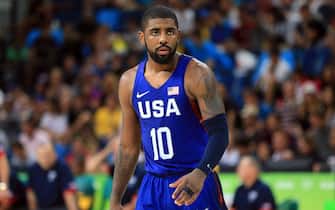 RIO DE JANEIRO, BRAZIL - AUGUST 21:  Kyrie Irving #10 of the USA looks on during the Men's Gold medal game between Serbia and the USA on Day 16 of the Rio 2016 Olympic Games at Carioca Arena 1 on August 21, 2016 in Rio de Janerio, Brazil.  (Photo by Vaughn Ridley/Getty Images)