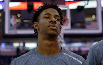 ORLANDO, FL - NOVEMBER 8: Ja Morant #12 of the Memphis Grizzlies looks on during the National Anthem before the game against the Orlando Magic at the Amway Center on November 8, 2019 in Orlando, Florida. The Magic defeated the Grizzlies 118 to 86. NOTE TO USER: User expressly acknowledges and agrees that, by downloading and or using this photograph, User is consenting to the terms and conditions of the Getty Images License Agreement. (Photo by Don Juan Moore/Getty Images)