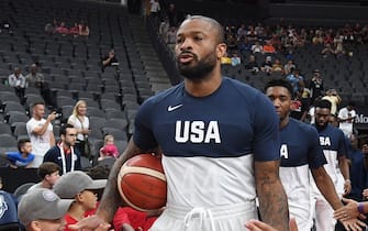 LAS VEGAS, NEVADA - AUGUST 09:  P.J. Tucker #44 of the 2019 USA Men's National Team is greeted by people being assisted by the Tragedy Assistance Program for Survivors (TAPS) before the 2019 USA Basketball Men's National Team Blue-White exhibition game at T-Mobile Arena on August 9, 2019 in Las Vegas, Nevada.  (Photo by Ethan Miller/Getty Images)
