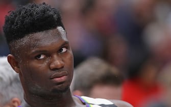 CHICAGO, ILLINOIS - FEBRUARY 06: Zion Williamson #1 of the New Orleans Pelicans watches from the bench as teammates take on the Chicago Bulls at the United Center on February 06, 2020 in Chicago, Illinois. NOTE TO USER: User expressly acknowledges and agrees that, by downloading and or using this photograph, User is consenting to the terms and conditions of the Getty Images License Agreement. (Photo by Jonathan Daniel/Getty Images)