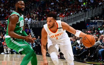 1198463860 ATLANTA, GA - FEBRUARY 3: Evan Turner #1 of the Atlanta Hawks handles the ball against the Boston Celtics on February 3, 2020 at State Farm Arena in Atlanta, Georgia. NOTE TO USER: User expressly acknowledges and agrees that, by downloading and/or using this Photograph, user is consenting to the terms and conditions of the Getty Images License Agreement. Mandatory Copyright Notice: Copyright 2020 NBAE (Photo by Scott Cunningham/NBAE via Getty Images)