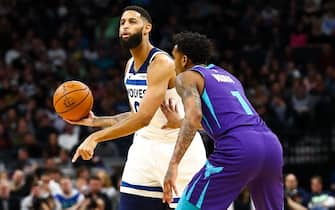 MINNEAPOLIS, MN - FEBRUARY 12: Allen Crabbe #9 of the Minnesota Timberwolves directs traffic while Malik Monk #1 of the Charlotte Hornets defends in the third quarter of the game at Target Center on February 12, 2020 in Minneapolis, Minnesota. The Hornets defeated the Timberwolves 115-108. NOTE TO USER: User expressly acknowledges and agrees that, by downloading and or using this Photograph, user is consenting to the terms and conditions of the Getty Images License Agreement. (Photo by David Berding/Getty Images)