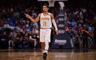 ORLANDO, FLORIDA - FEBRUARY 10: Trae Young #11 of the Atlanta Hawks points to the bench in the first half against the Orlando Magic at Amway Center on February 10, 2020 in Orlando, Florida.  NOTE TO USER: User expressly acknowledges and agrees that, by downloading and/or using this photograph, user is consenting to the terms and conditions of the Getty Images License Agreement.  (Photo by Mark Brown/Getty Images)