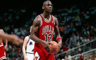 ORLANDO, FL - FEBRUARY 14:  Michael Jordan of the Chicago Bulls shoots a free throw wearing jersey #12 for the only time in his career due to the fact that his #23 jersey was stolen prior to the NBA game against the Orlando Magic at the Orlando Arena on November 5, 1990 in Orlando, Florida.  NOTE TO USER: User expressly acknowledges and agrees that, by downloading and/or using this Photograph, User is consenting to the terms and conditions of the Getty Images License Agreement  Mandatory Copyright Notice:  Copyright 1990 NBAE  (Photo by Fernando Medina/NBAE via Getty Images)