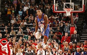 56882485 HOUSTON - FEBRUARY 18: Nate Robinson #4 of the New York Knicks throws the ball off the back board on a dunk attempt during the Sprite Rising Stars Slam Dunk Contest on All-Star Saturday Night during 2006 All-Star Weekend February 18, 2006 at the Toyota Center in Houston, Texas. NOTE TO USER: User expressly acknowledges and agrees that, by downloading and or using this photograph, user is consenting to the terms and conditions of the Getty Images License Agreement. Mandatory Copyright Notice: Copyright 2006 NBAE (Photo by Nathaniel S. Butler/NBAE via Getty Images)