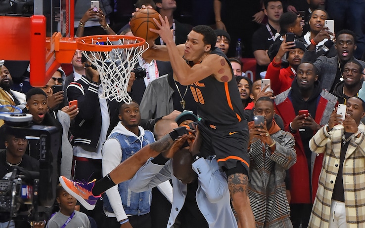 1201212647 CHICAGO, IL - FEBRUARY 15: Aaron Gordon #00 of the Orlando Magic dunks the ball over Tacko Fall #99 of the Boston Celtics during the AT&T Slam Dunk as part of 2020 NBA All-Star Weekend on February 15, 2020 at United Center in Chicago, Illinois. NOTE TO USER: User expressly acknowledges and agrees that, by downloading and/or using this Photograph, user is consenting to the terms and conditions of the Getty Images License Agreement. Mandatory Copyright Notice: Copyright 2020 NBAE (Photo by Bill Baptist/NBAE via Getty Images)