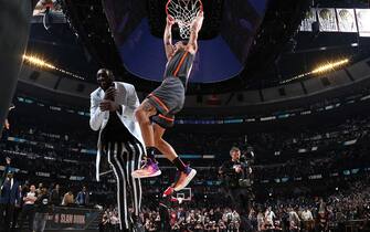 CHICAGO, IL - FEBRUARY 15: Aaron Gordon #00 of the Orlando Magic dunks the ball over Tacko Fall #99 of the Boston Celtics during the 2020 NBA All-Star - AT&T Slam Dunk on February 15, 2020 at the United Center in Chicago, Illinois. NOTE TO USER: User expressly acknowledges and agrees that, by downloading and or using this photograph, User is consenting to the terms and conditions of the Getty Images License Agreement. Mandatory Copyright Notice: Copyright 2020 NBAE (Photo by Nathaniel S. Butler/NBAE via Getty Images)