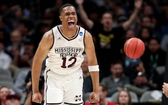 SAN JOSE, CALIFORNIA - MARCH 22: Robert Woodard #12 of the Mississippi State Bulldogs reacts to a play against the Liberty Flames during their game in the First Round of the NCAA Basketball Tournament at SAP Center on March 22, 2019 in San Jose, California. (Photo by Ezra Shaw/Getty Images)