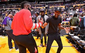 619012584 LOS ANGELES, CA - OCTOBER 26: Rapper, Nipsey Hussle shakes hands with James Harden #13 of the Houston Rockets before the game against the Los Angeles Lakers on October 26, 2016 at STAPLES Center in Los Angeles, California. NOTE TO USER: User expressly acknowledges and agrees that, by downloading and/or using this Photograph, user is consenting to the terms and conditions of the Getty Images License Agreement. Mandatory Copyright Notice: Copyright 2016 NBAE (Photo by Andrew D. Bernstein/NBAE via Getty Images)