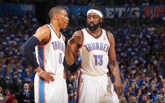114501410 OKLAHOMA CITY, OK - MAY 21: Oklahoma City Thunder point guard Russell Westbrook #0 and Oklahoma City Thunder guard James Harden #13 confer during a play against the Dallas Mavericks during Game Three of the Western Conference Finals in the 2011 NBA Playoffs on May 21, 2011 at Oklahoma City Arena in Oklahoma City, Oklahoma. The Maverics won 93-87. NOTE TO USER: User expressly acknowledges and agrees that, by downloading and or using this photograph, User is consenting to the terms and conditions of the Getty Images License Agreement. Mandatory Copyright Notice: Copyright 2011 NBAE (Photo by Joe Murphy/NBAE via Getty Images)