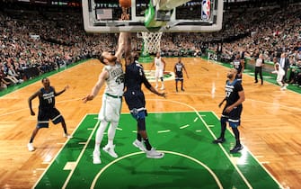BOSTON, MA - JANUARY 5:  Aron Baynes #46 of the Boston Celtics and Gorgui Dieng #5 of the Minnesota Timberwolves battle for the ball during the game on January 5, 2018 at the TD Garden in Boston, Massachusetts. NOTE TO USER: User expressly acknowledges and agrees that, by downloading and or using this photograph, User is consenting to the terms and conditions of the Getty Images License Agreement. Mandatory Copyright Notice: Copyright 2018 NBAE (Photo by Brian Babineau/NBAE via Getty Images)