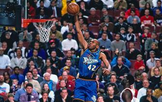 PHILADELPHIA, PA - FEBRUARY 9: Jerry Stackhouse #42 of the Detroit Pistons dunks the ball against the Philadelphia 76ers on February 9, 1999 at the First Union Center in Philadelphia, Pennsylvania. NOTE TO USER: User expressly acknowledges and agrees that, by downloading and or using this photograph, User is consenting to the terms and conditions of the Getty Images License Agreement. Mandatory Copyright Notice: Copyright 1999 NBAE  (Photo by Nathaniel S. Butler/NBAE via Getty Images)